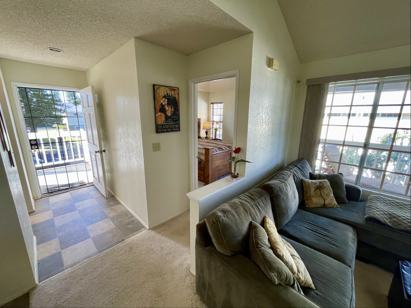 68-3883 Lua Kula Street, Unit 2005 Waikoloa, HI 96738 - Photo 3 of 28 a living room with furniture and a large window