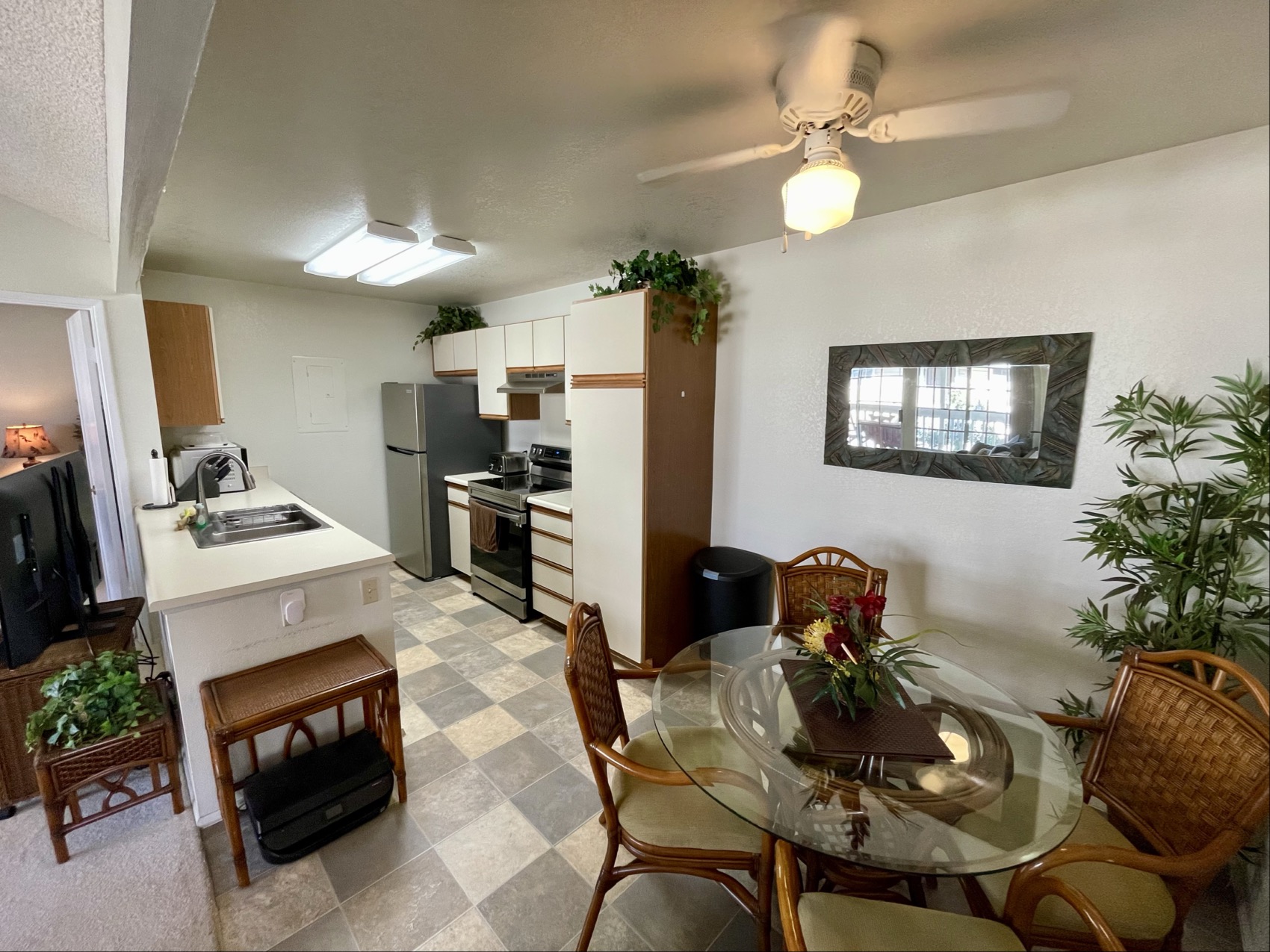 68-3883 Lua Kula Street, Unit 2005 Waikoloa, HI 96738 - Photo 5 of 28 a kitchen with furniture and a stove