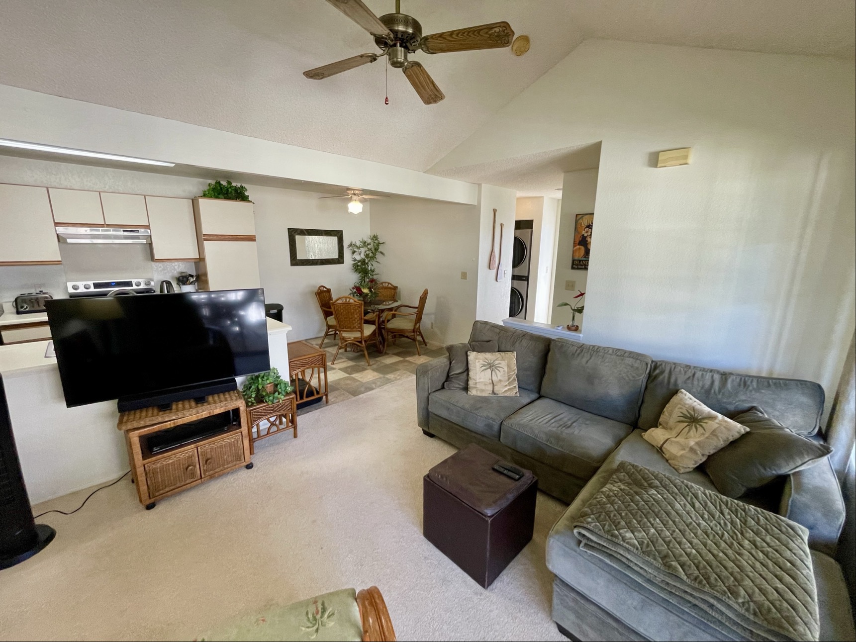 68-3883 Lua Kula Street, Unit 2005 Waikoloa, HI 96738 - Photo 8 of 28 a living room with furniture and a flat screen tv