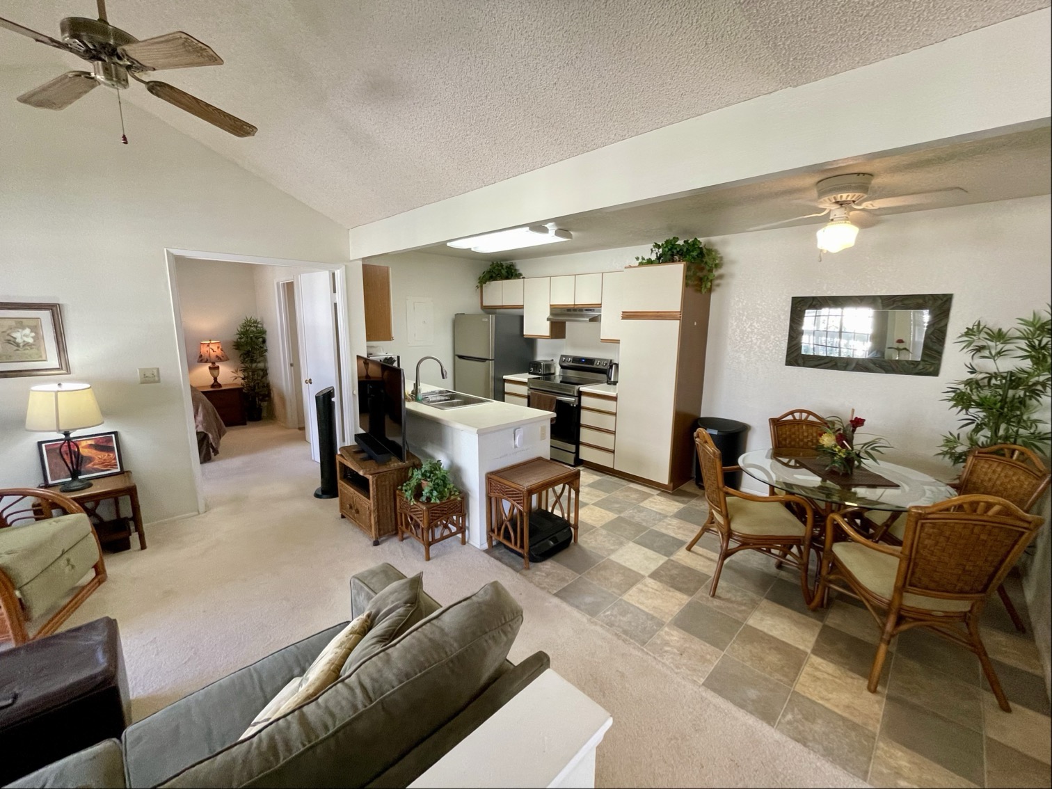 68-3883 Lua Kula Street, Unit 2005 Waikoloa, HI 96738 - Photo 9 of 28 a living room with furniture and a wooden floor