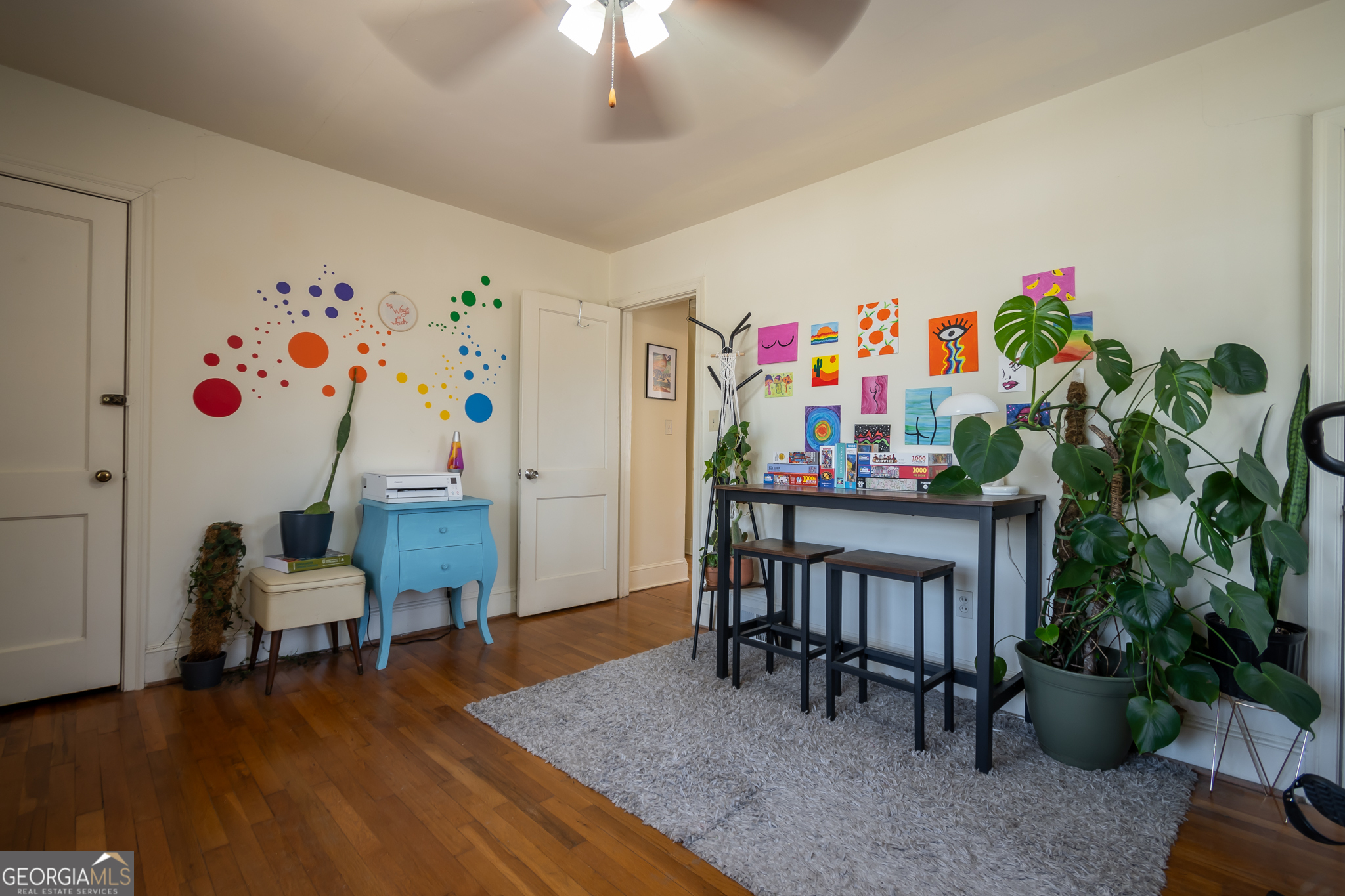 118 University Drive Athens, GA 30605 - Photo 17 of 29 a bedroom with furniture and a potted plant