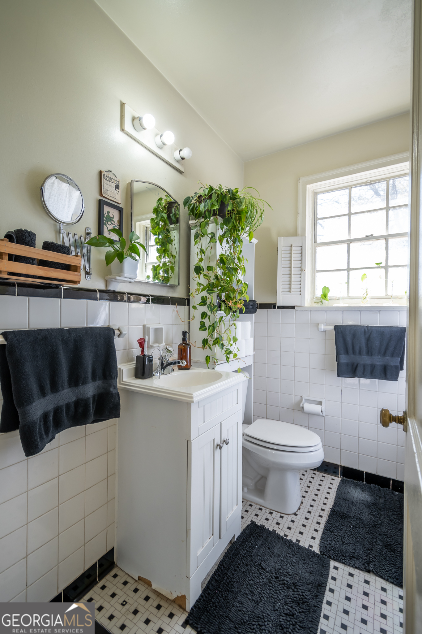 118 University Drive Athens, GA 30605 - Photo 18 of 29 a bathroom with a sink a toilet and window