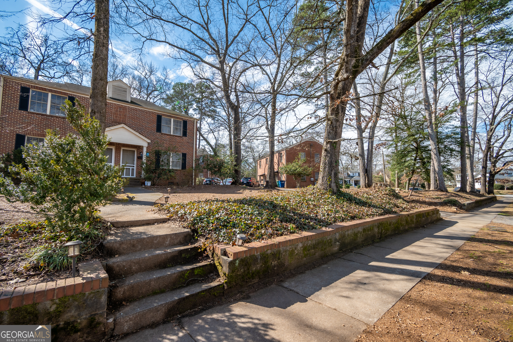 118 University Drive Athens, GA 30605 - Photo 21 of 29 a front view of a house with a yard