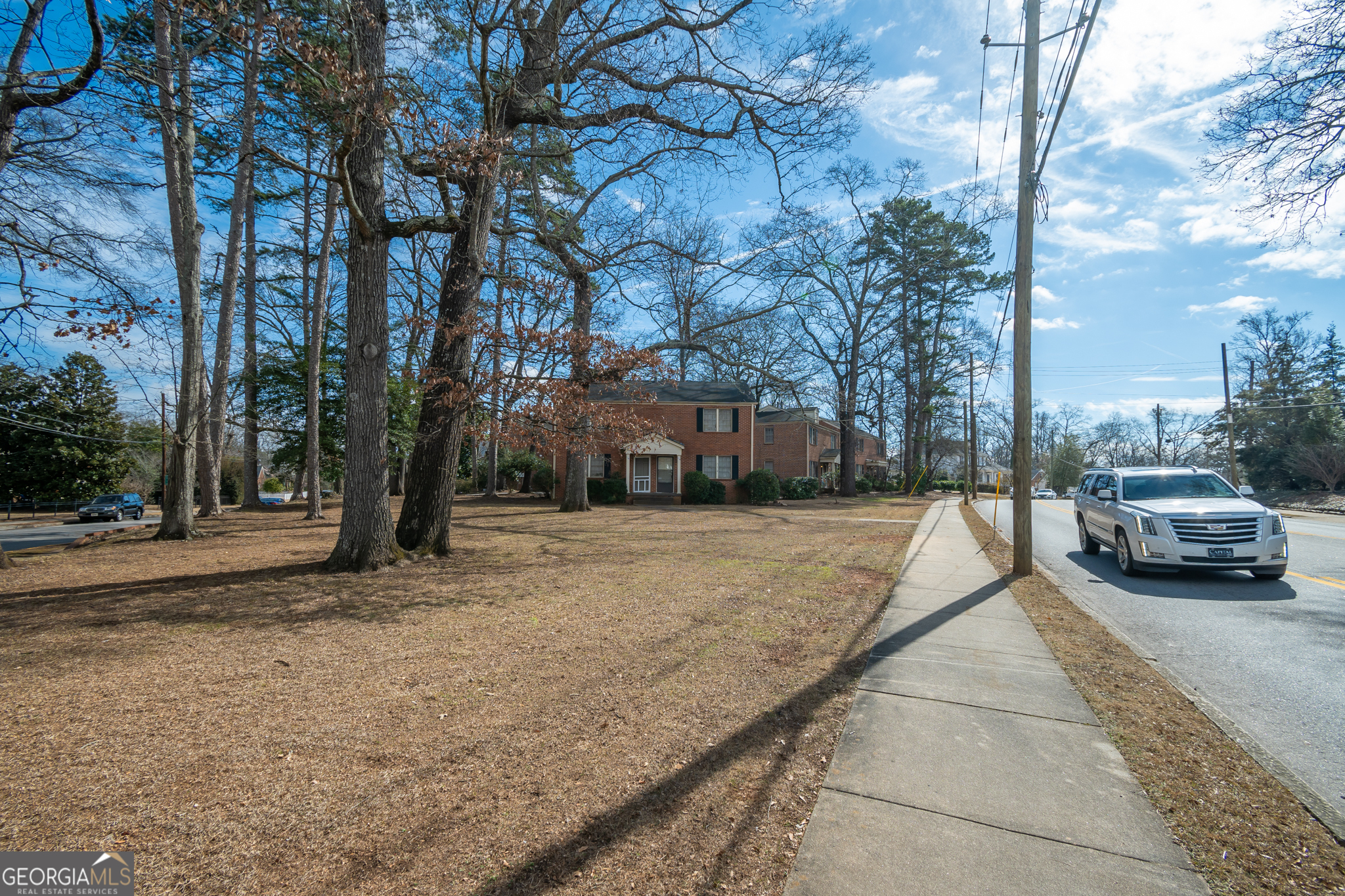 118 University Drive Athens, GA 30605 - Photo 22 of 29 a view of street with parked cars