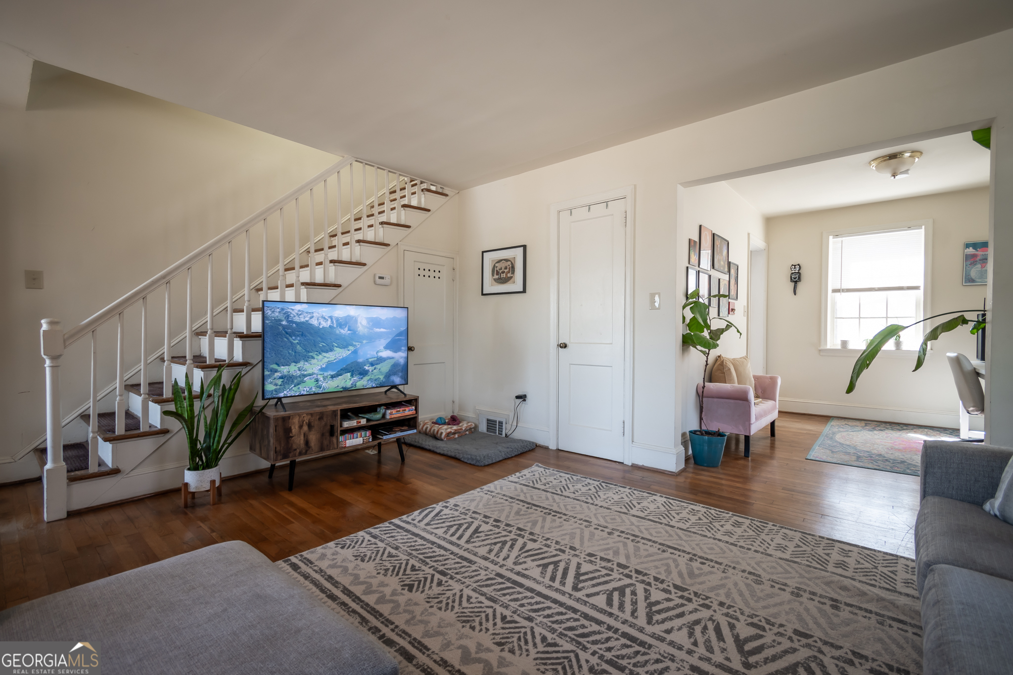 118 University Drive Athens, GA 30605 - Photo 5 of 29 a bedroom with furniture and a wooden floor