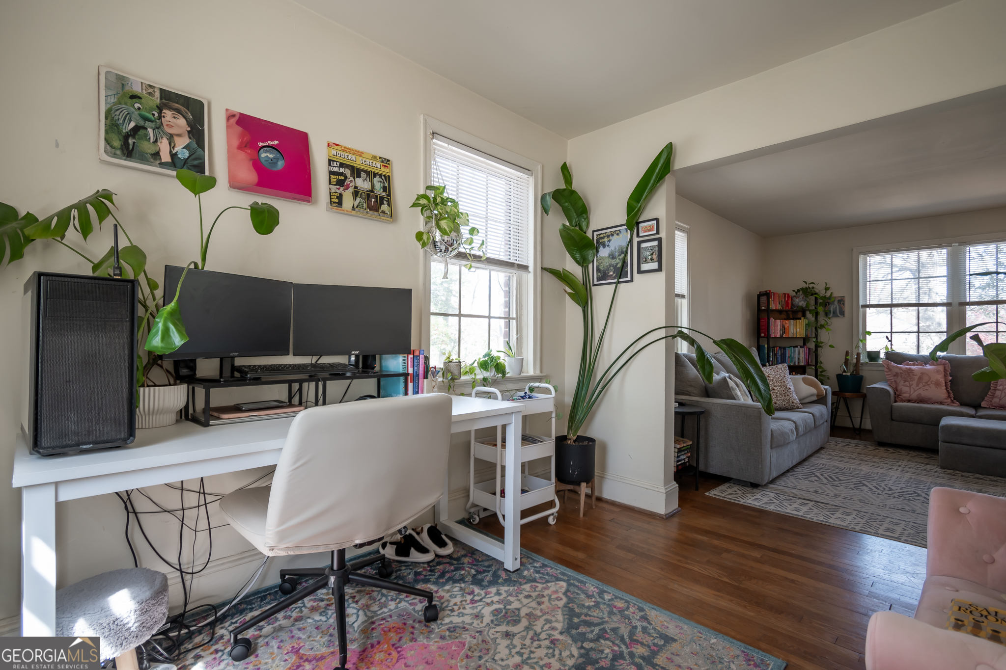 118 University Drive Athens, GA 30605 - Photo 7 of 29 a living room with furniture and a flat screen tv