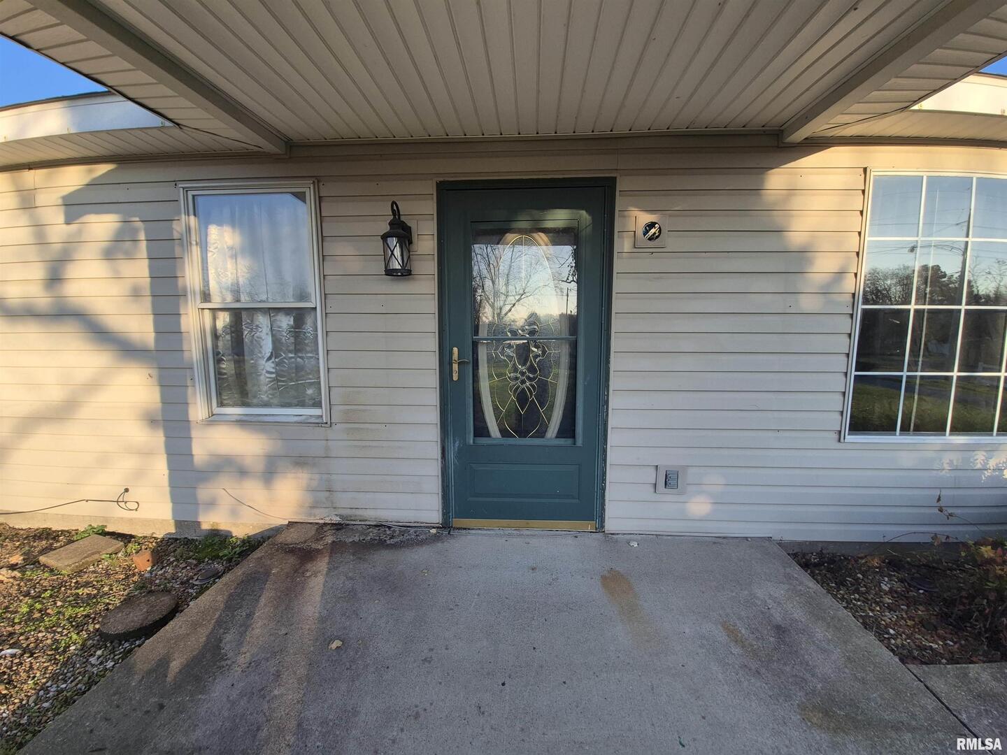 1100 Moore Street Eldorado, IL 62930 - Photo 2 of 20 a view of front door of house