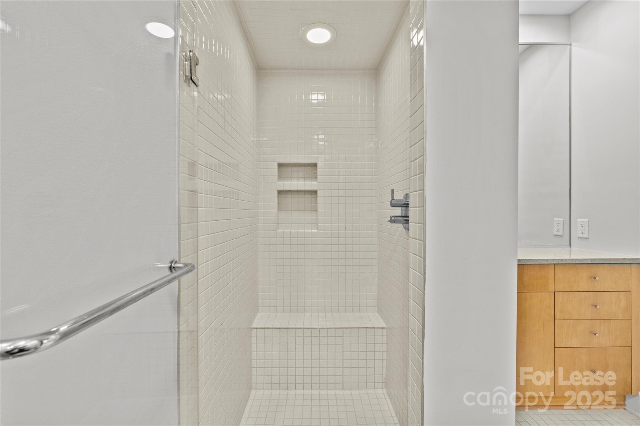 420 Queens Road, Unit 7 Charlotte, NC 28207 - Photo 24 of 46 a bathroom with a shower