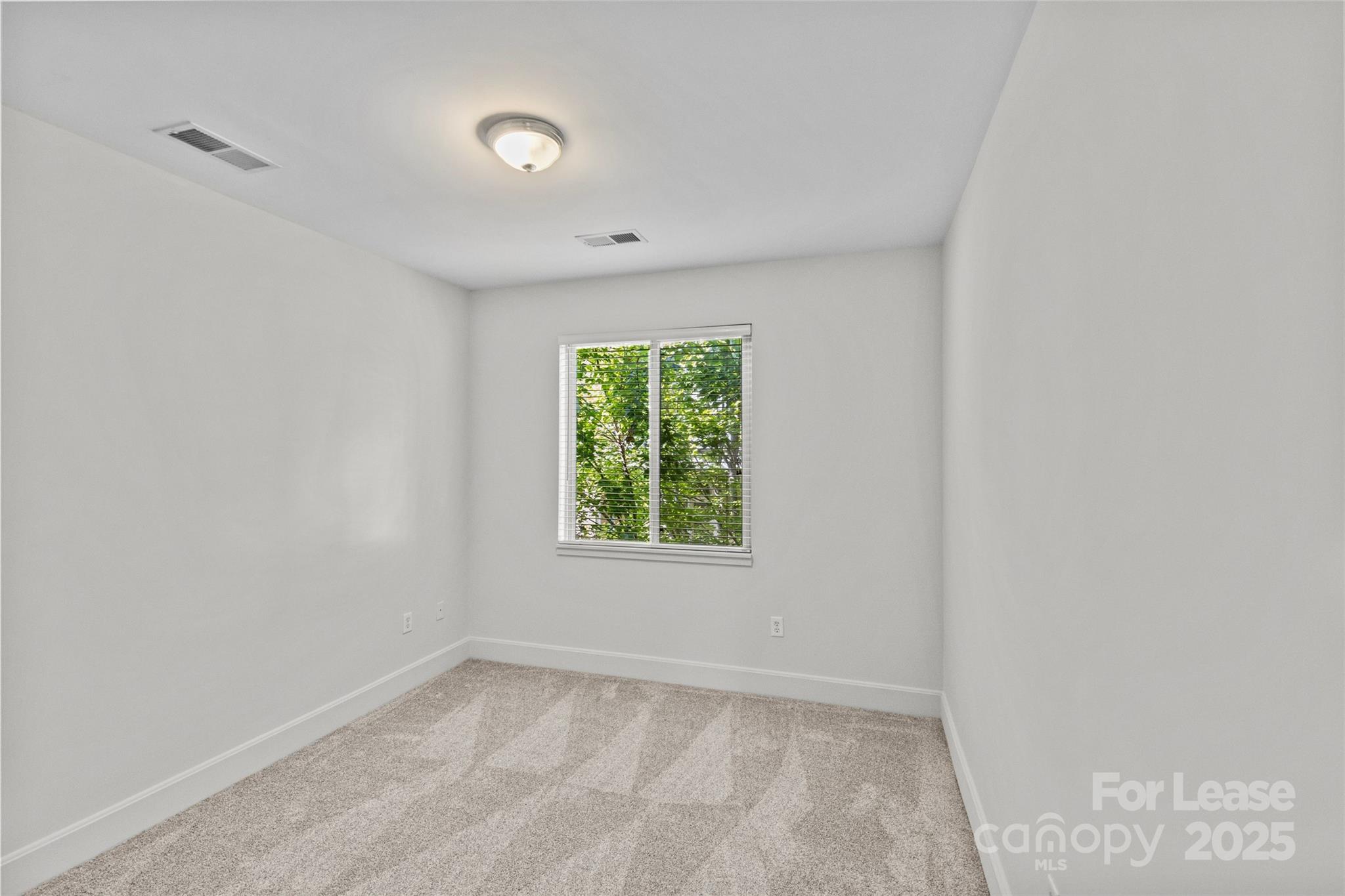 420 Queens Road, Unit 7 Charlotte, NC 28207 - Photo 40 of 46 a view of a window in a room