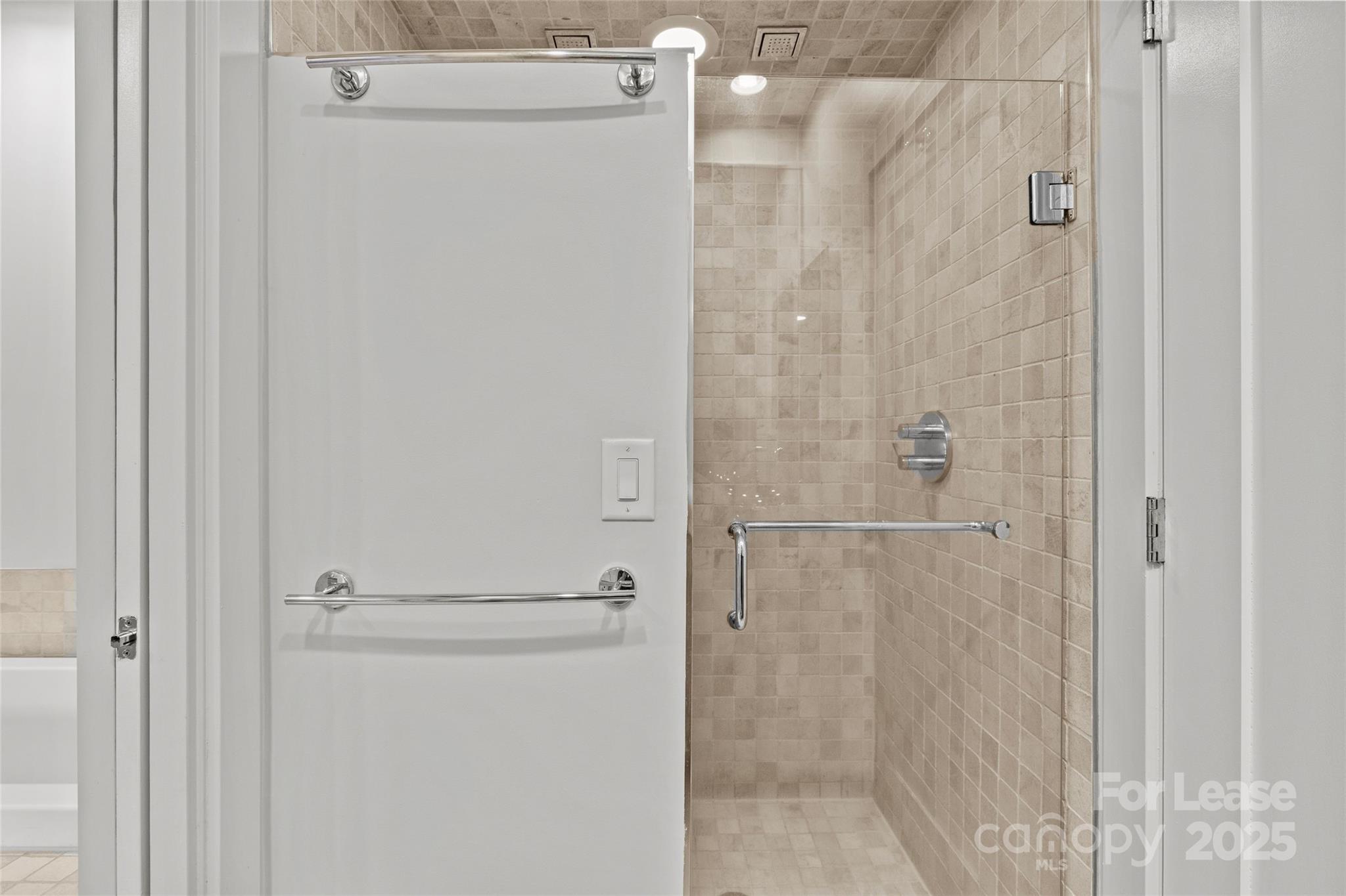 420 Queens Road, Unit 7 Charlotte, NC 28207 - Photo 45 of 46 a bathroom with a shower