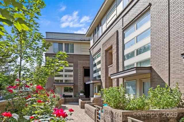 a front view of a multi story residential apartment building