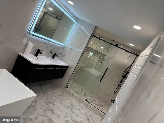 a living room with table and chairs