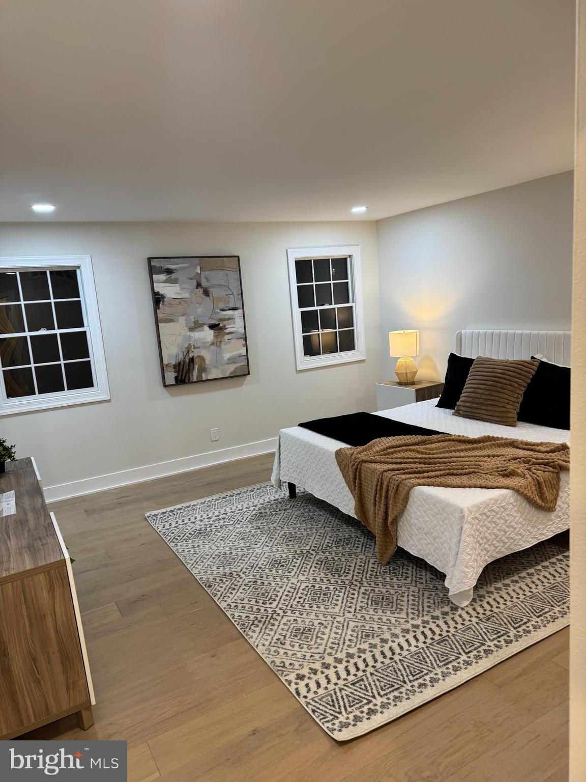 826 Pardee Lane Wyncote, PA 19095 - Photo 7 of 7 a bedroom with a bed and a couch