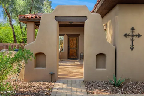 an aerial view of a house with a garden