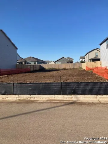 a view of a street with an ocean view