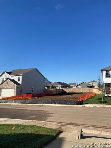 a view of gym equipment and a fire place