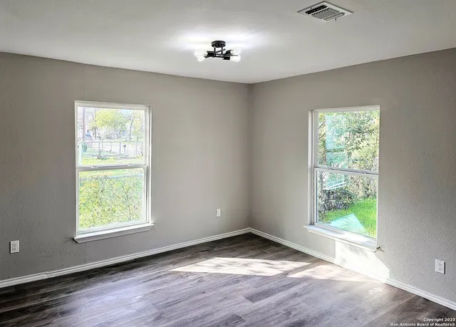a view of empty room with a window