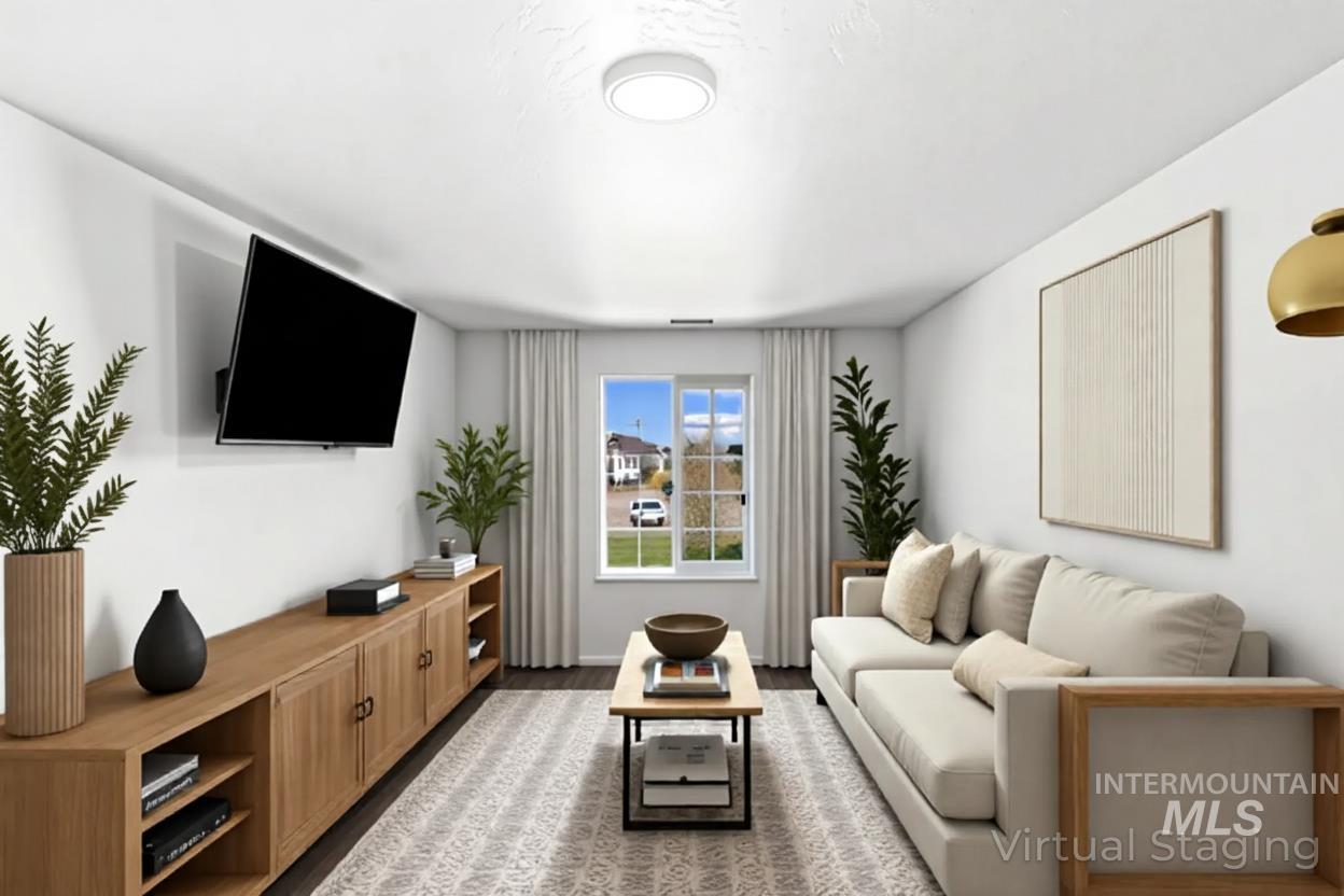 12731 Sondra Street Caldwell, ID 83607 - Photo 31 of 46 Upstairs recreation room. Virtually staged