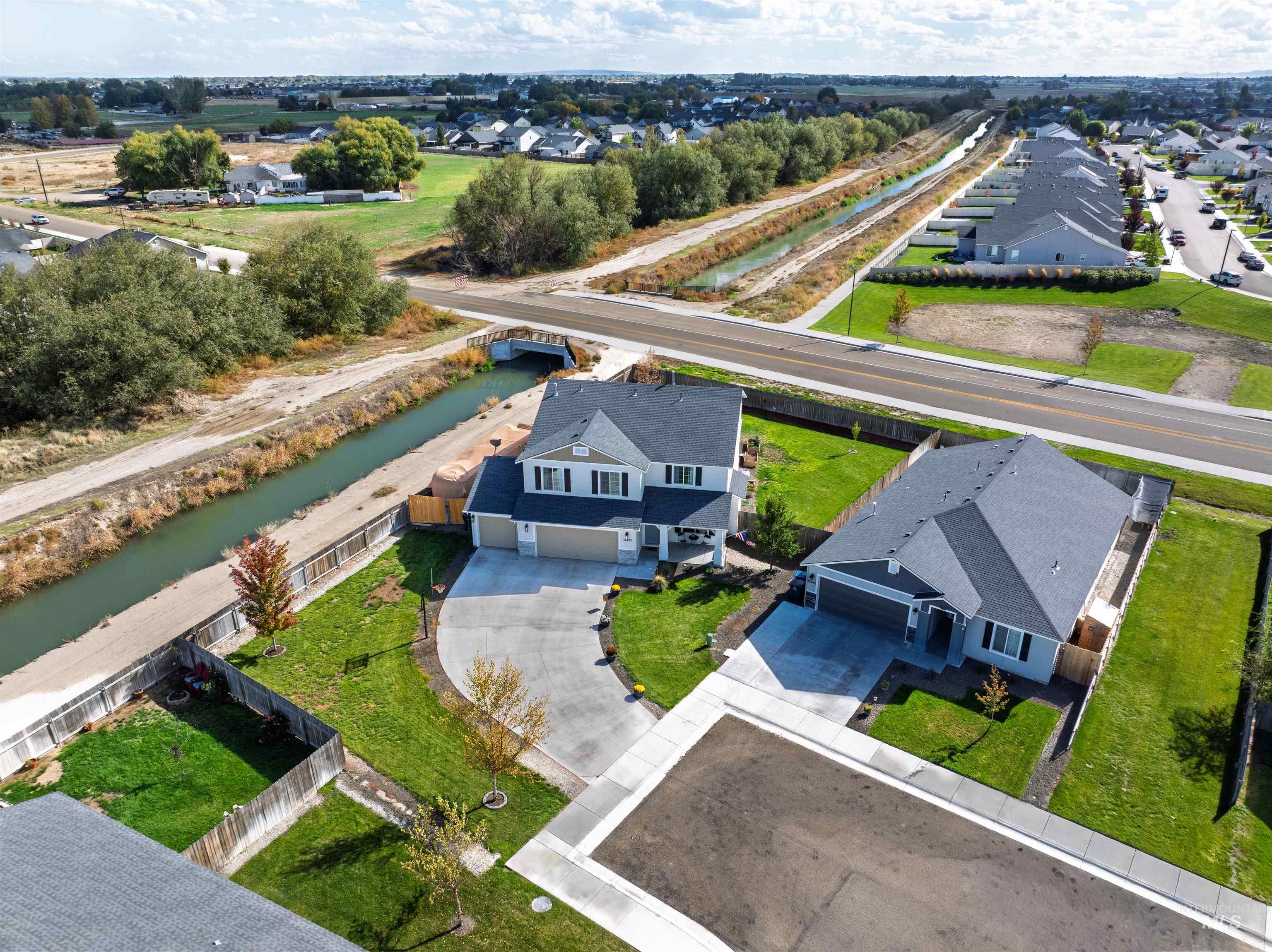 12731 Sondra Street Caldwell, ID 83607 - Photo 39 of 46 Aerial view of residential area featuring a large body of water