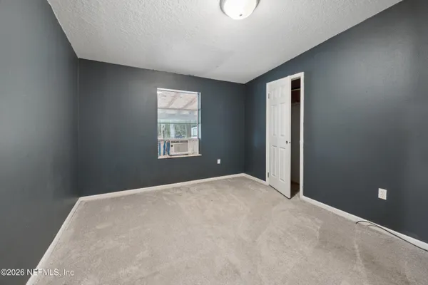a view of a livingroom with a window