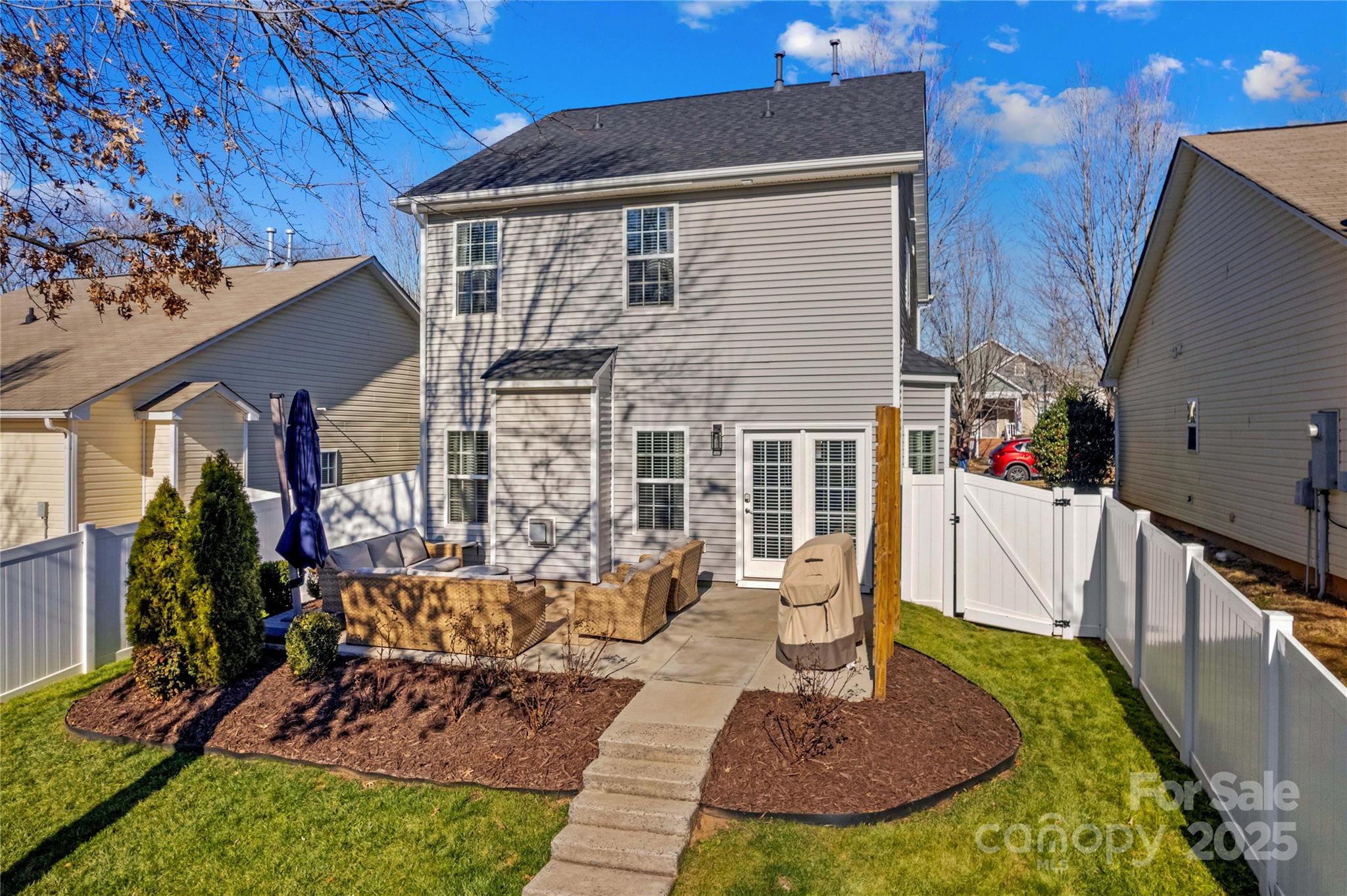 19510 Deer Valley Drive Cornelius, NC 28031 - Photo 38 of 48 a view of a house with backyard porch and sitting area