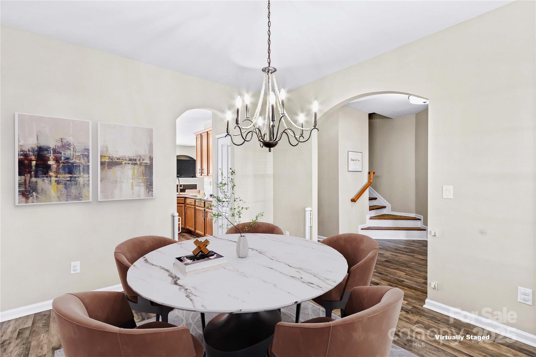 19510 Deer Valley Drive Cornelius, NC 28031 - Photo 9 of 48 a view of a dining room with furniture and chandelier