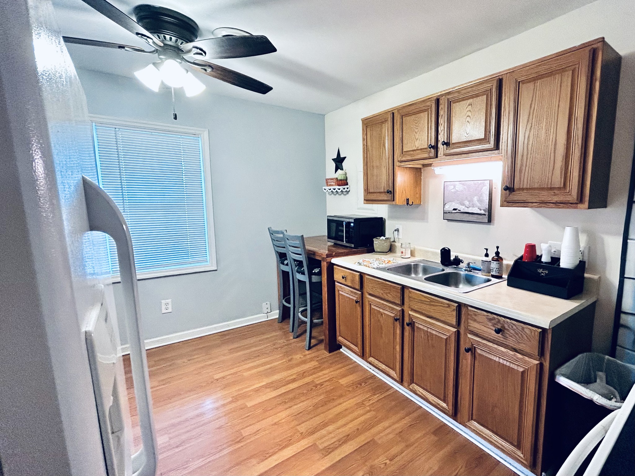 982 Donahue Road Pulaski, TN 38478 - Photo 4 of 12 a kitchen with stainless steel appliances granite countertop a sink stove and refrigerator
