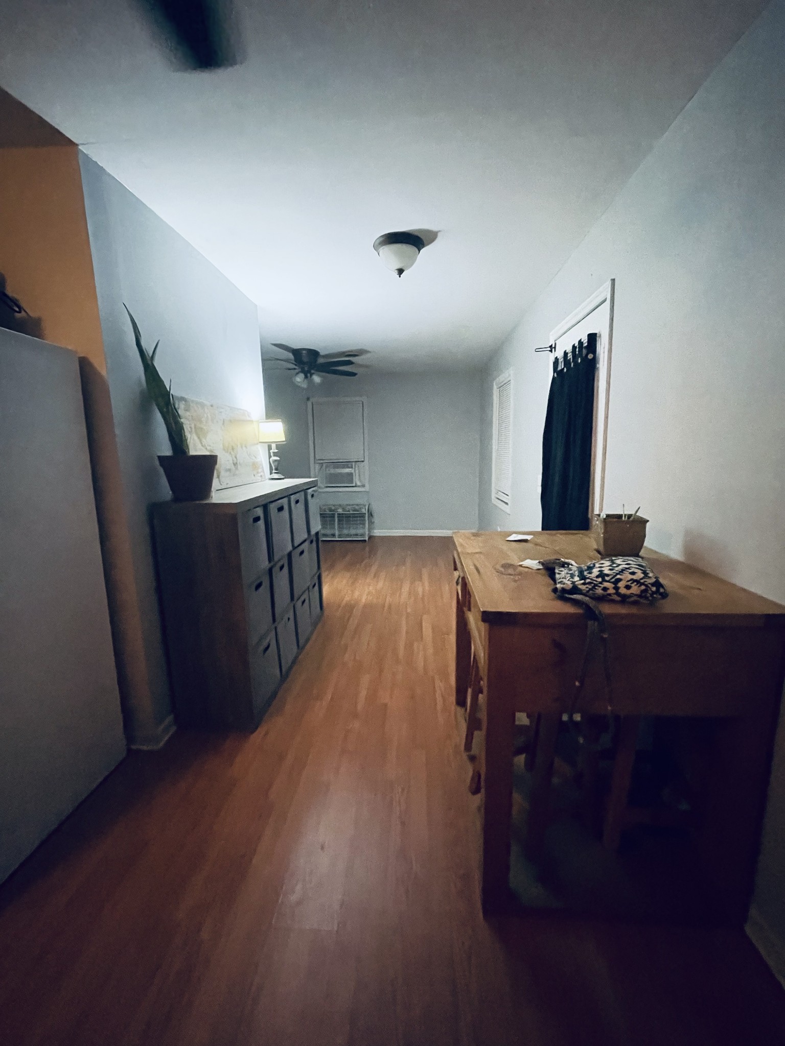 982 Donahue Road Pulaski, TN 38478 - Photo 9 of 12 a room with a cabinets and wooden floor