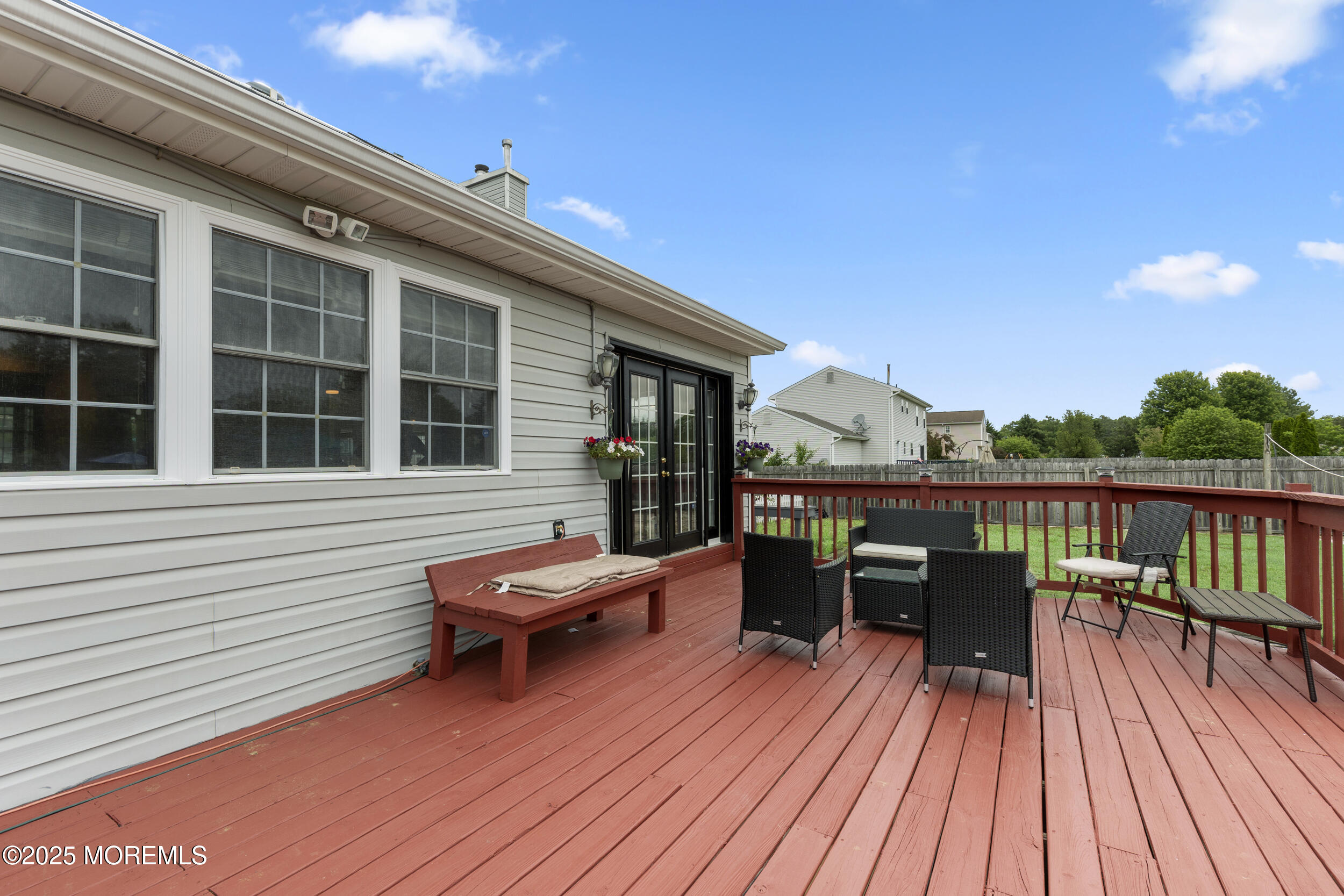 1 Skylark Drive Jackson, NJ 08527 - Photo 49 of 61 a balcony with wooden floor table and chairs