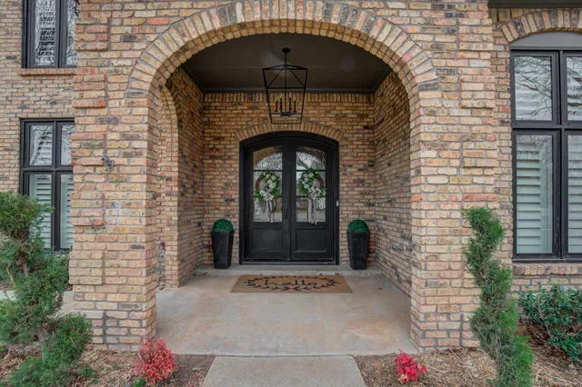 a front view of a house with garage