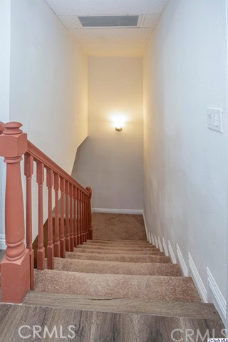 1523 East Windsor Road, Unit 209A Glendale, CA 91205 - Photo 13 of 29 a view of a hallway with staircase