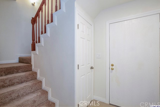 1523 East Windsor Road, Unit 209A Glendale, CA 91205 - Photo 14 of 29 a view of staircase with white walls