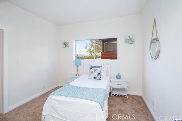 1523 East Windsor Road, Unit 209A Glendale, CA 91205 - Photo 16 of 29 a bathroom with a sink toilet and window