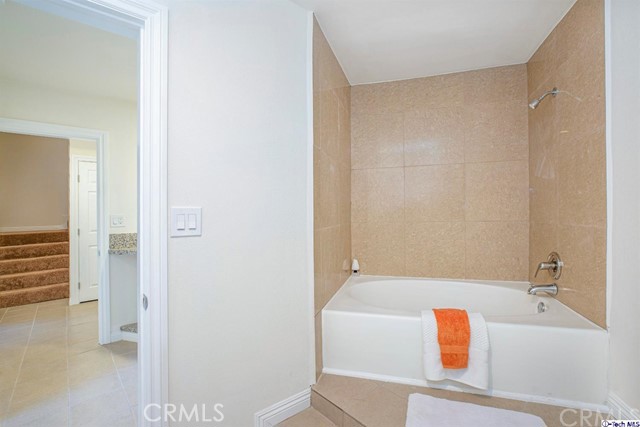 1523 East Windsor Road, Unit 209A Glendale, CA 91205 - Photo 19 of 29 a bathroom with a tub and shower