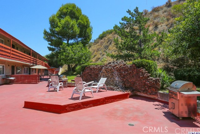 1523 East Windsor Road, Unit 209A Glendale, CA 91205 - Photo 24 of 29 a view of a patio with swimming pool