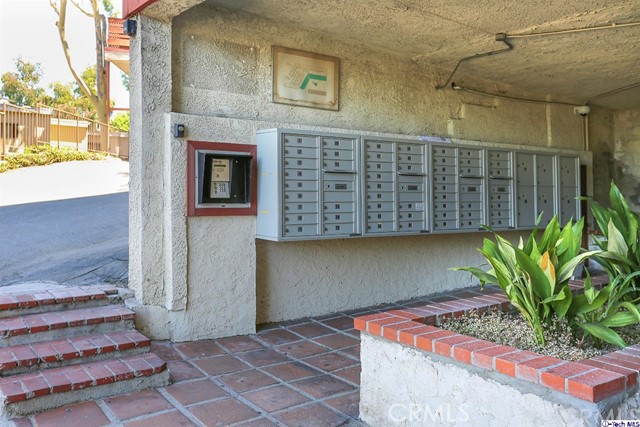 1523 East Windsor Road, Unit 209A Glendale, CA 91205 - Photo 28 of 29 a view of entryway with a potted plant