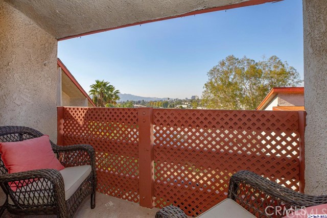 1523 East Windsor Road, Unit 209A Glendale, CA 91205 - Photo 10 of 29 a view of a bench in the roof