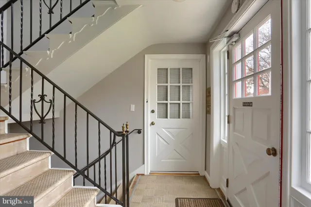 a view of an entryway with staircase