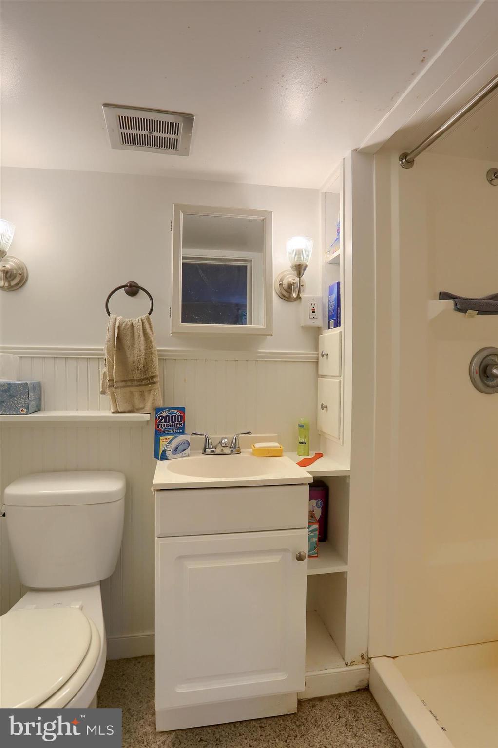 1515 Esbenshade Road Lancaster, PA 17601 - Photo 24 of 34 a bathroom with a toilet sink and mirror