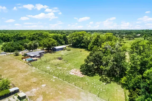 a view of a lake with a yard