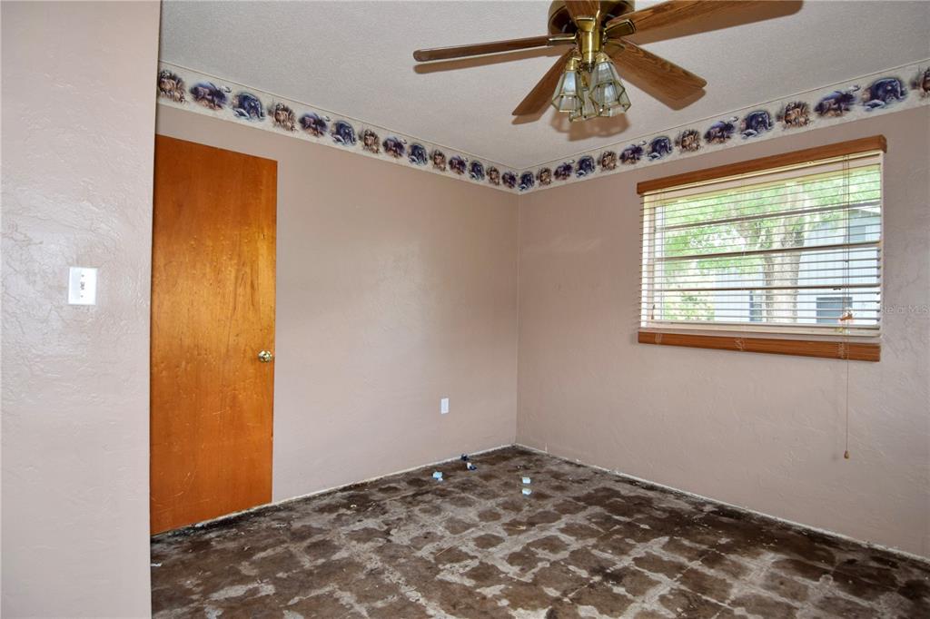 1508 Lake Mills Road Chuluota, FL 32766 - Photo 34 of 37 a view of a room with window and wooden floor