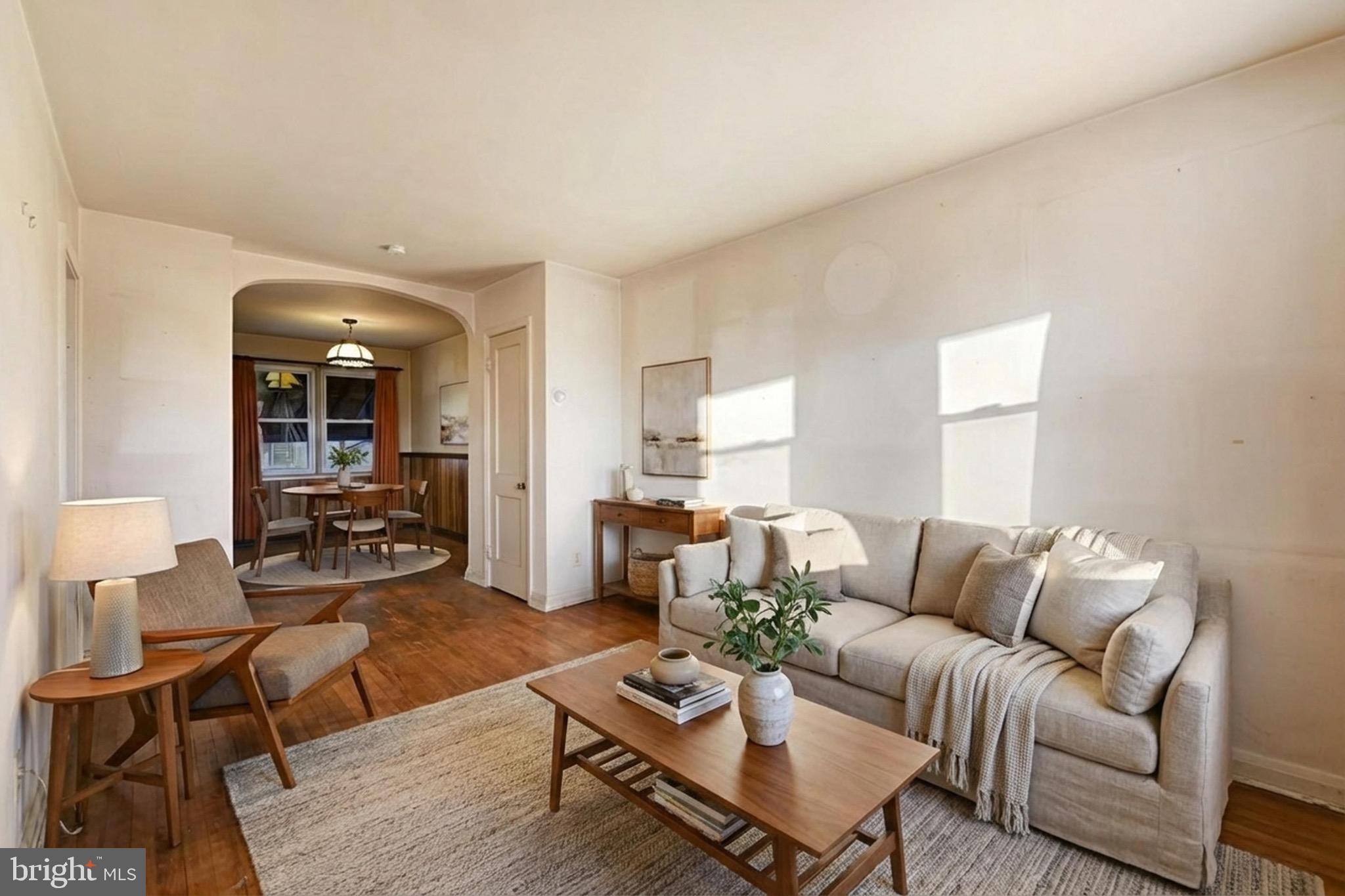 414 Kane Street Baltimore, MD 21224 - Photo 4 of 15 a living room with furniture and wooden floor