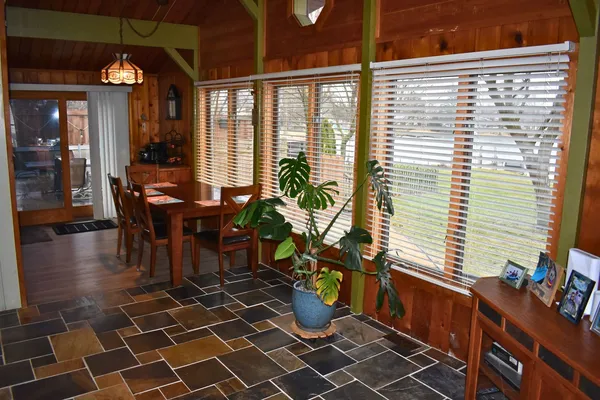 a view of a balcony with dining area