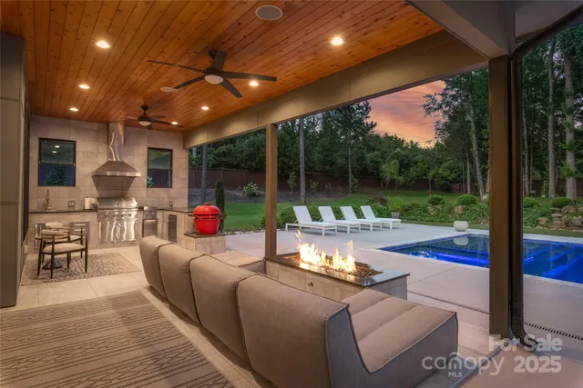 a house view with a sitting space and garden space