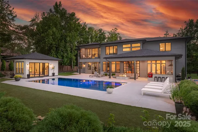 a front view of a house with swimming pool