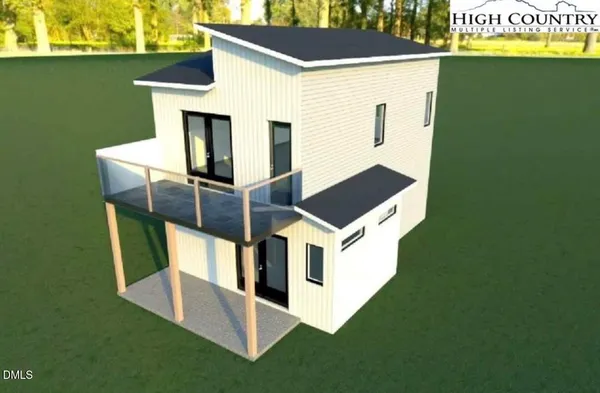 a view of house with backyard