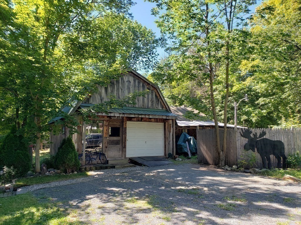 4 Pleasant Street Huntington, MA 01050 - Photo 11 of 38 a view of a house with a yard