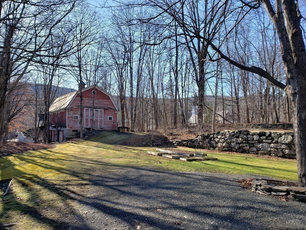 4 Pleasant Street Huntington, MA 01050 - Photo 19 of 38 a view of a house with a yard