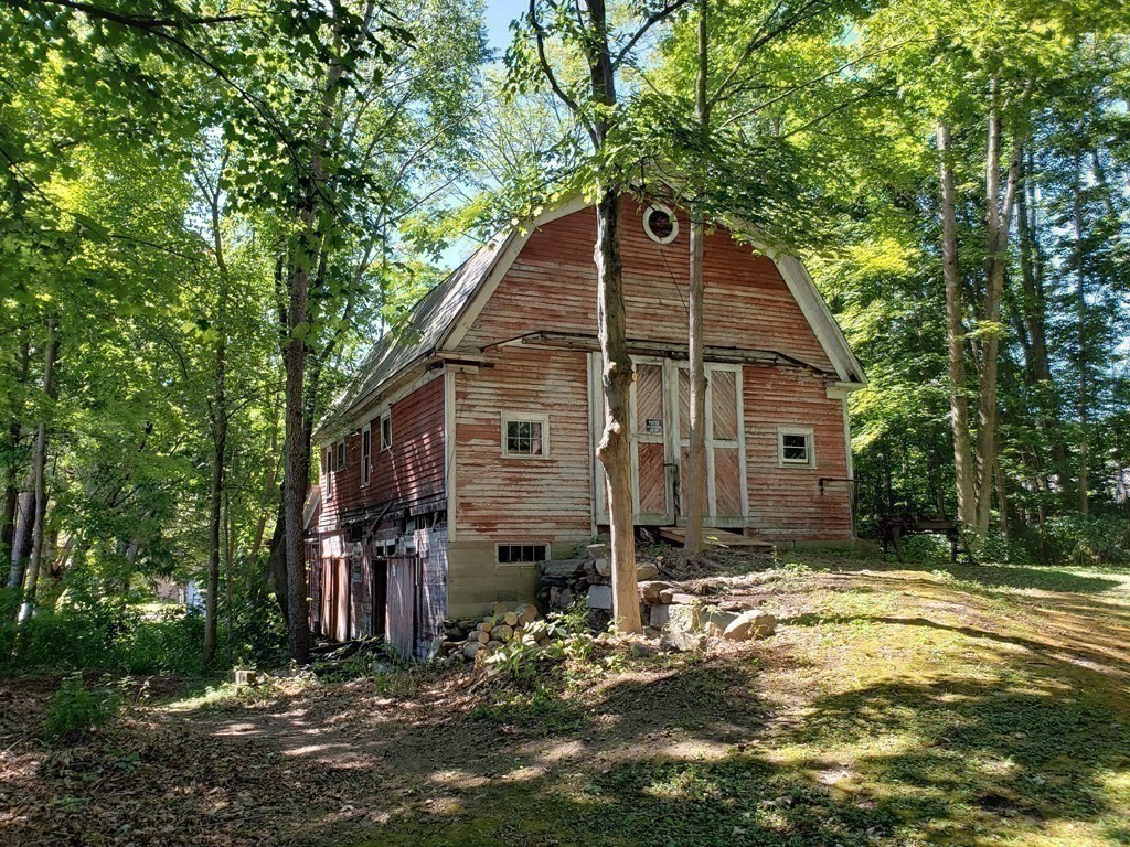 4 Pleasant Street Huntington, MA 01050 - Photo 20 of 38 a house with trees in the background