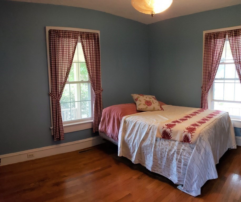 4 Pleasant Street Huntington, MA 01050 - Photo 30 of 38 a bedroom with a bed and a window